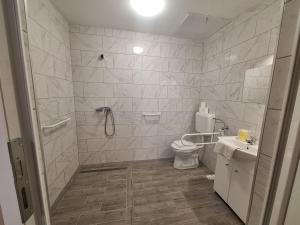 Koupelna v ubytování Hotel Unicornis