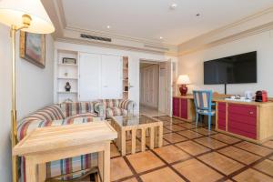 Телевизор и/или развлекательный центр в Hotel Playa Victoria