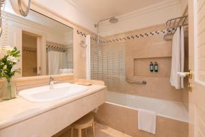 Ванная комната в Hotel Playa Victoria
