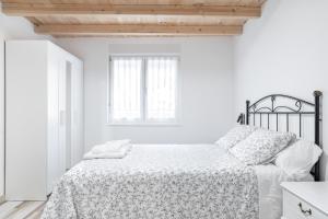 Postel nebo postele na pokoji v ubytování Oviedo Rural