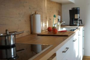 Cucina o angolo cottura di Gemütliche Wohnung in unmittelbarer Nähe zum See