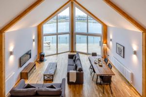 an overhead view of a living room with a large window at Landal Twin Lakes in Carnforth