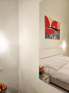 A bed or beds in a room at Maison Carolina