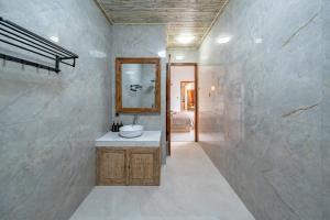 Koupelna v ubytování Ketut Losmen Villas Lembongan + 24 fotografií