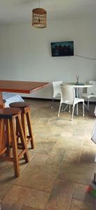a room with chairs and a table and a table and chairs at Alfonsina y el Mar in Mar del Plata +6 photos