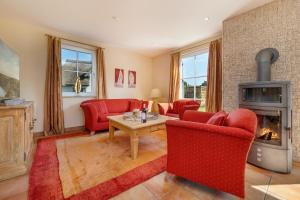 Posezení v ubytování Ferienhaus Nordlicht + 17 fotografií