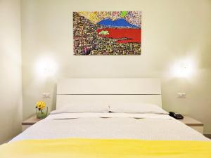 A bed or beds in a room at Maison Carolina