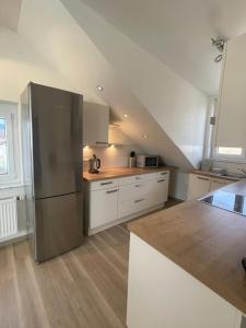 Kuchyň nebo kuchyňský kout v ubytování Ferienwohnung MaRe
