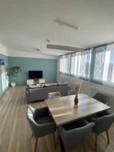 TV a/nebo společenská místnost v ubytování Ferienwohnung MaRe