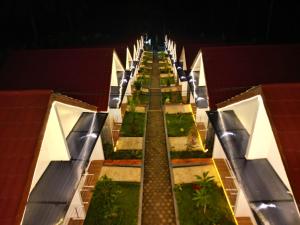 Taman di luar Sambas Cottages