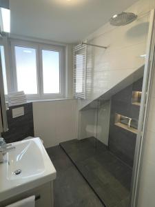 Koupelna v ubytování Ferienwohnung MaRe + 6 fotografií