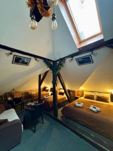 Postel nebo postele na pokoji v ubytování Pirocanac Rest&Rooms top 25