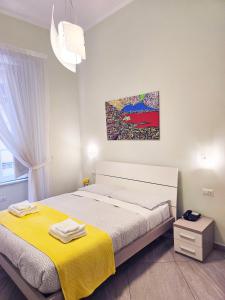 A bed or beds in a room at Maison Carolina
