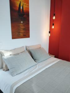 Posteľ alebo postele v izbe v ubytovaní ILEKTRA Apartments Blue & Red