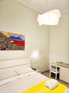 A bed or beds in a room at Maison Carolina