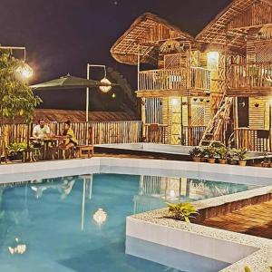 Bazén v ubytování ramfels paradise resort nebo v jeho okolí