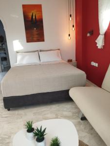 Posteľ alebo postele v izbe v ubytovaní ILEKTRA Apartments Blue & Red