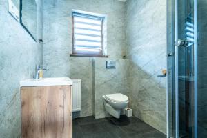 Vannituba majutusasutuses Podhale Cottages - Domki Podhalańskie