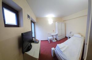 TV a/nebo společenská místnost v ubytování Guest House ANEX