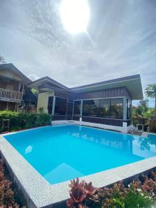 Bazén v ubytování ramfels paradise resort nebo v jeho okolí