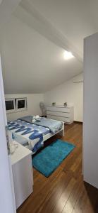 Postel nebo postele na pokoji v ubytování Apartman Grošić