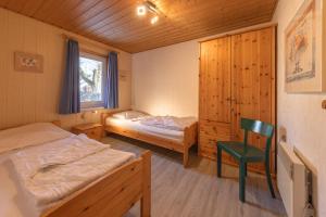 Ένα ή περισσότερα κρεβάτια σε δωμάτιο στο Reiher 25