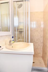 Ένα μπάνιο στο Beachfront Selfcatering