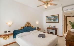 Postel nebo postele na pokoji v ubytování Hotel Porto Roca