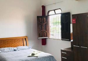 Postel nebo postele na pokoji v ubytování Pousada Apart Fraga Maia