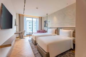 Park Inn by Radisson Jalandhar客房内的一张或多张床位