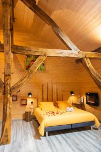 Postel nebo postele na pokoji v ubytování Maison d'hôtes et SPA La Boucotte + 37 fotografií