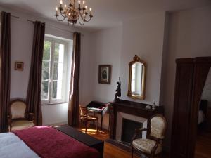 O zonă de relaxare la Bed & Breakfast L'Orangerie