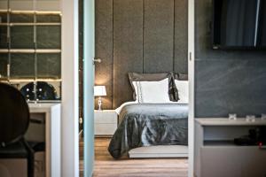 Posteľ alebo postele v izbe v ubytovaní RentPlanet - Studio Ruska