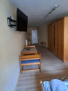 TV a/nebo společenská místnost v ubytování Trixis