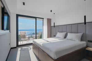 Postel nebo postele na pokoji v ubytování Hotel Ad Turres
