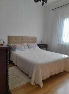 Postel nebo postele na pokoji v ubytování Praia Espinho