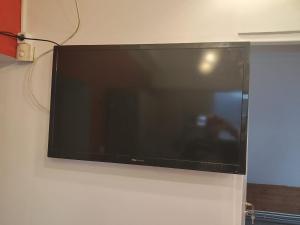TV a/nebo společenská místnost v ubytování Pension DonauBlick Grein 2 in Stifterstrasse 19A