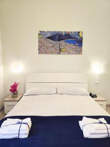 A bed or beds in a room at Maison Carolina