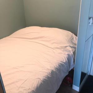 A bed or beds in a room at Room with a view