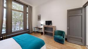 Televiisor ja/või meelelahutuskeskus majutusasutuses Maison Colodge DELORY BARBIEUX