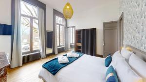 Voodi või voodid majutusasutuse Maison Colodge DELORY BARBIEUX toas