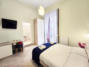 A bed or beds in a room at Maison Carolina