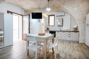 Η κουζίνα ή μικρή κουζίνα στο Casa Sardella, in pieno Centro Storico a 300 mt dal mare +13 φωτογραφίες