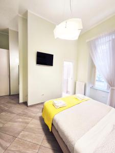A bed or beds in a room at Maison Carolina