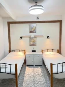 Hotel Arganda客房内的一张或多张床位