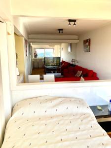 Ένα ή περισσότερα κρεβάτια σε δωμάτιο στο Monoambiente Microcentro Capital Federal Bs As 201 +4 φωτογραφίες