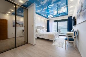 Postel nebo postele na pokoji v ubytování Apartments Villa Sonja + 47 fotografií