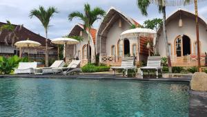 Bazén v ubytování Daghan Cottage Nusa Penida nebo v jeho okolí