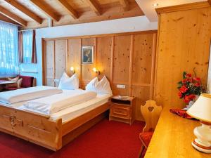 Posteľ alebo postele v izbe v ubytovaní Hotel Stolz