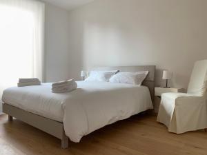 Letto o letti in una camera di Spazio Perlasca Apt 2 - Cernobbio Como Lake